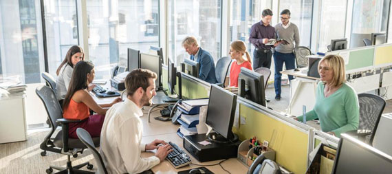 Workers sat in an office